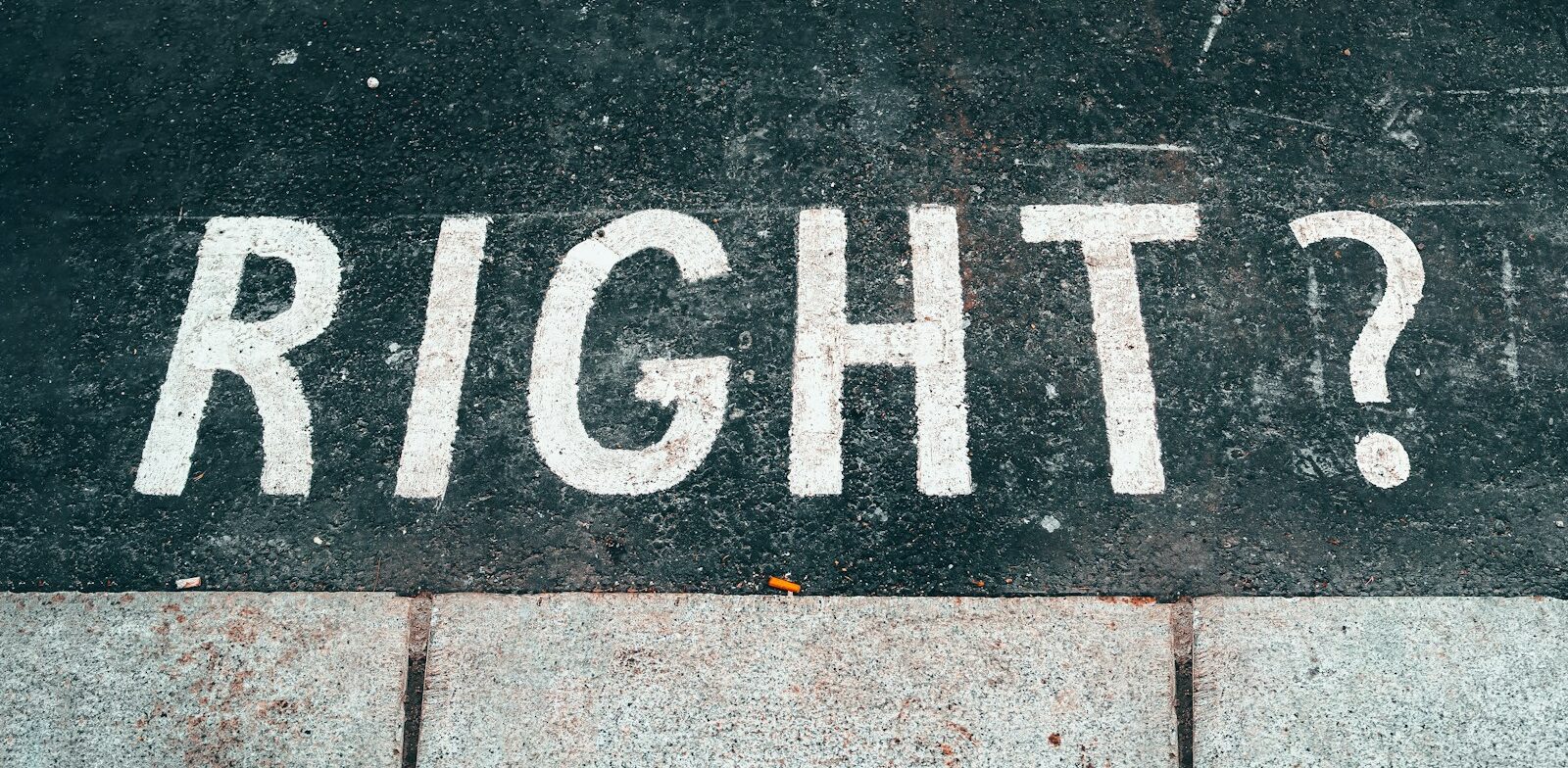 black and white stop road sign